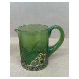 Olive green glass creamer