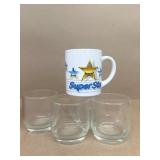 Clear glasses and coffee mug in