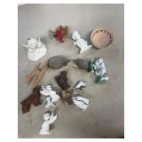 Miniature figures, porcupines, squirrel, dog