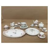 Miniature tea cups tea pot cream and sugar