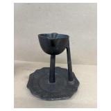 Cast-iron candle holder