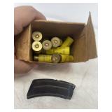 Winchester shotgun shells and a gun clip