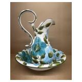 The painted bowling pitcher does have crack