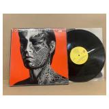 Rolling Stones tattoo you record album