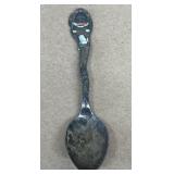 Sterling silver spoon person eating watermelon