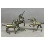(3) brass unicorns