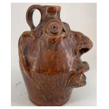 BROWN"s POTTERY GROTESQUE FACE JUG