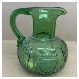 Green blown glass pitcher early