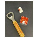 Coca-Cola advertising tape measure bottle opener
