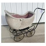 1920s wicker buggy, wood spokes with rubber wood