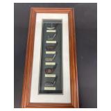 Golf putters and drivers display