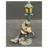 Cast-iron singing in the rain man holding to