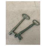 Two large brass skeleton keys