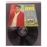 Elvis Presley kissing Cousin