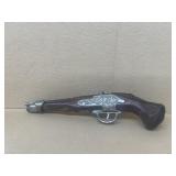 Cologne bottle gun