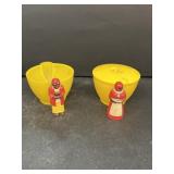 Black memorabilia, cream, and sugar