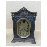 Cast-iron antique clock