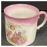 Early child's cup girl with puppies