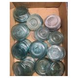 Blue glass jar, caps lids