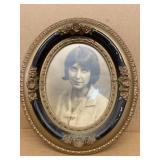 Early portrait of young lady framed