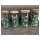 (4) freezer jars of marbles