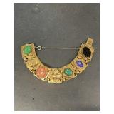Antique bracelet with red green black stones