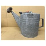 Galvanized watering can