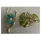 Pair of colorful, brooches, wishbone, and flour