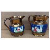 Pair of Early Copper Lusterware pitchers with woma