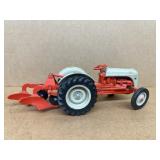 Ford 1/16 scale toy tractor with plow