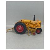 Minneapolis Moline diecast tractor with rake