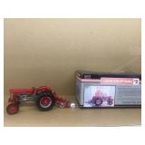 MF 65 tractor with 62 plow