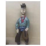 Hand carved wooden cowboy