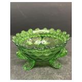 Green glass footed candy dish