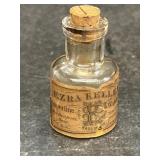 EZRA KELLEY watch oil advertising bottle