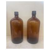 Two large amber bottles
