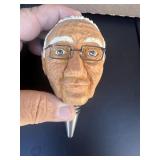 Hand carved head bottle cork