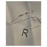 Sterling silver necklace with R pendant