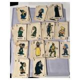 Snow White, and the seven dwarfs playing cards
