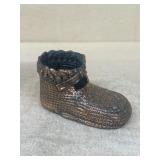 Sue wheelers first baby shoe in bronze