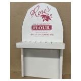 Roses, beach flour, advertising utensil holder