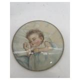 Vintage bubble glass with portrait of baby