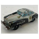 Tin AMI police car