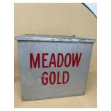Meadow, gold milk box