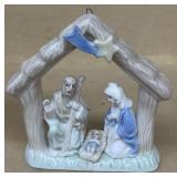 Porcelain manger figure