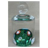 Green, colorful paperweight