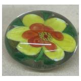 Paperweigh,t yellow with orange flower