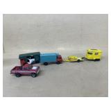 Early matchbox trucks and farm trailer