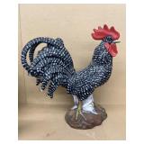 Rooster statue does have a few chips