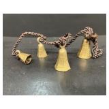 String of brass bells